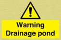 warning-drainage-pond~